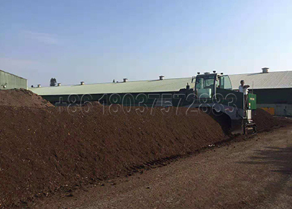 Windrow turner for animal manure composting