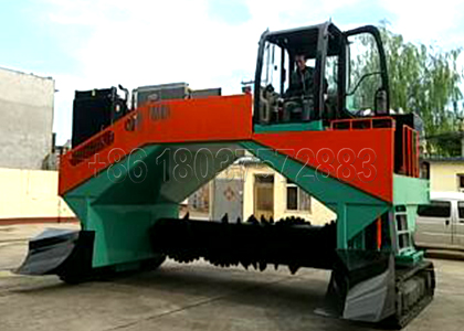 SEEC crawler type compost turner for biosolids processing