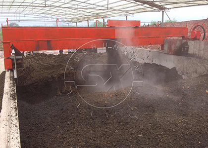 Wheel type large scale compost turner working